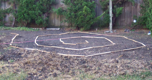 Labyrinth sketched out with kindling wood